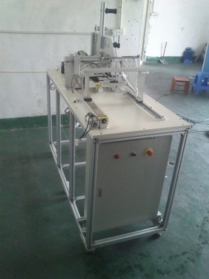 自动贴附设备在电子产品制造中的应用与深圳市同富自动化机械设备介绍